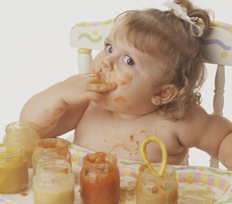 Messy Baby Feeding Herself